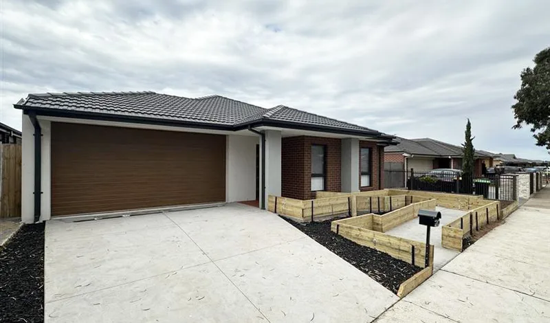 The outside front view of a large suburban house.